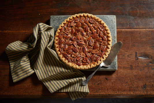 Brazos Bottom Pecan Pie on Wooden Table